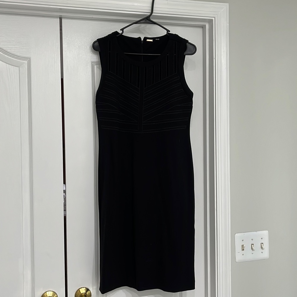Black Knit Tahari dress. Beautiful pointelle details on bodice.